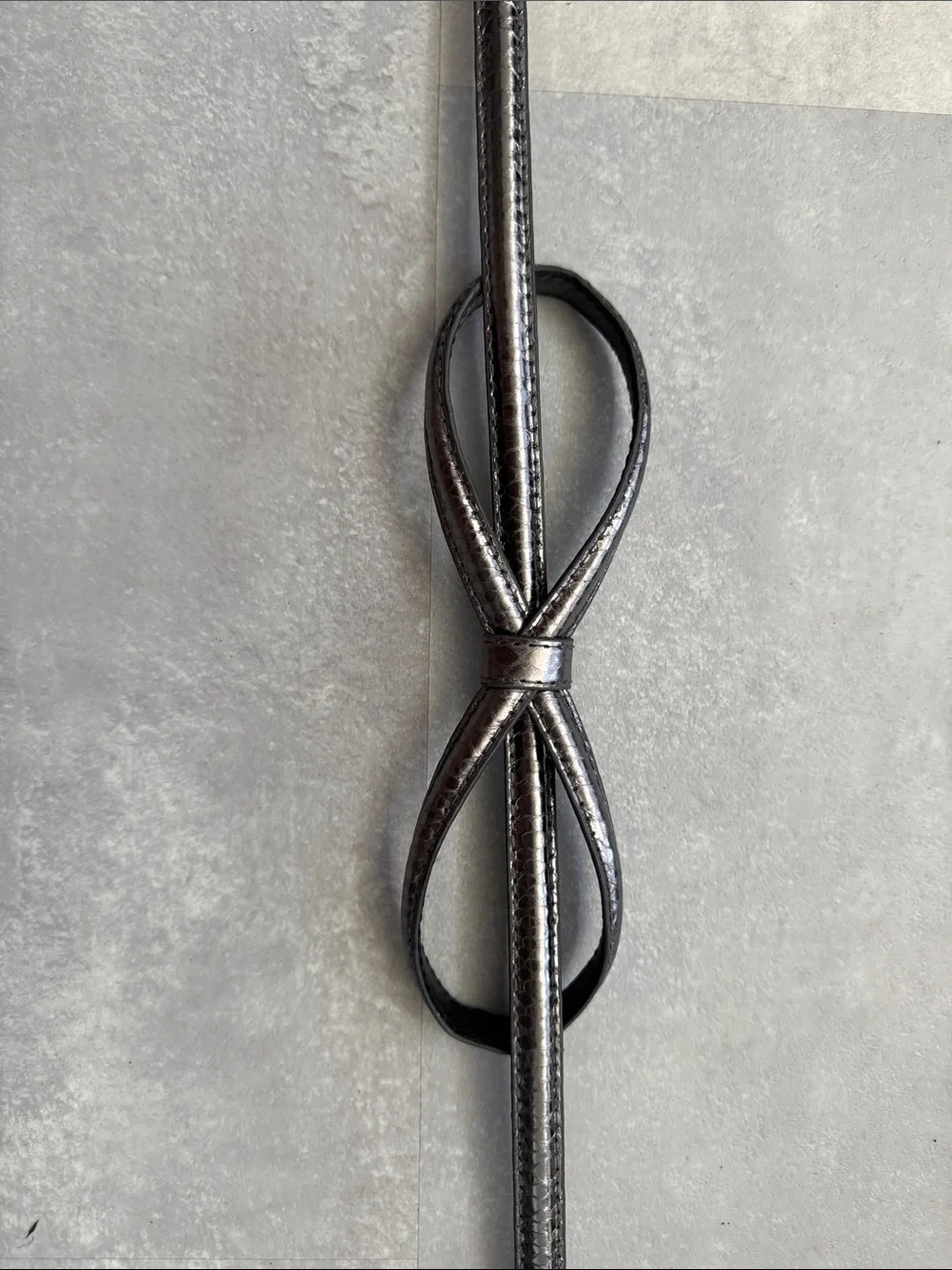 Dark gray silver dress belt.  Perfect accent to a pant or dress